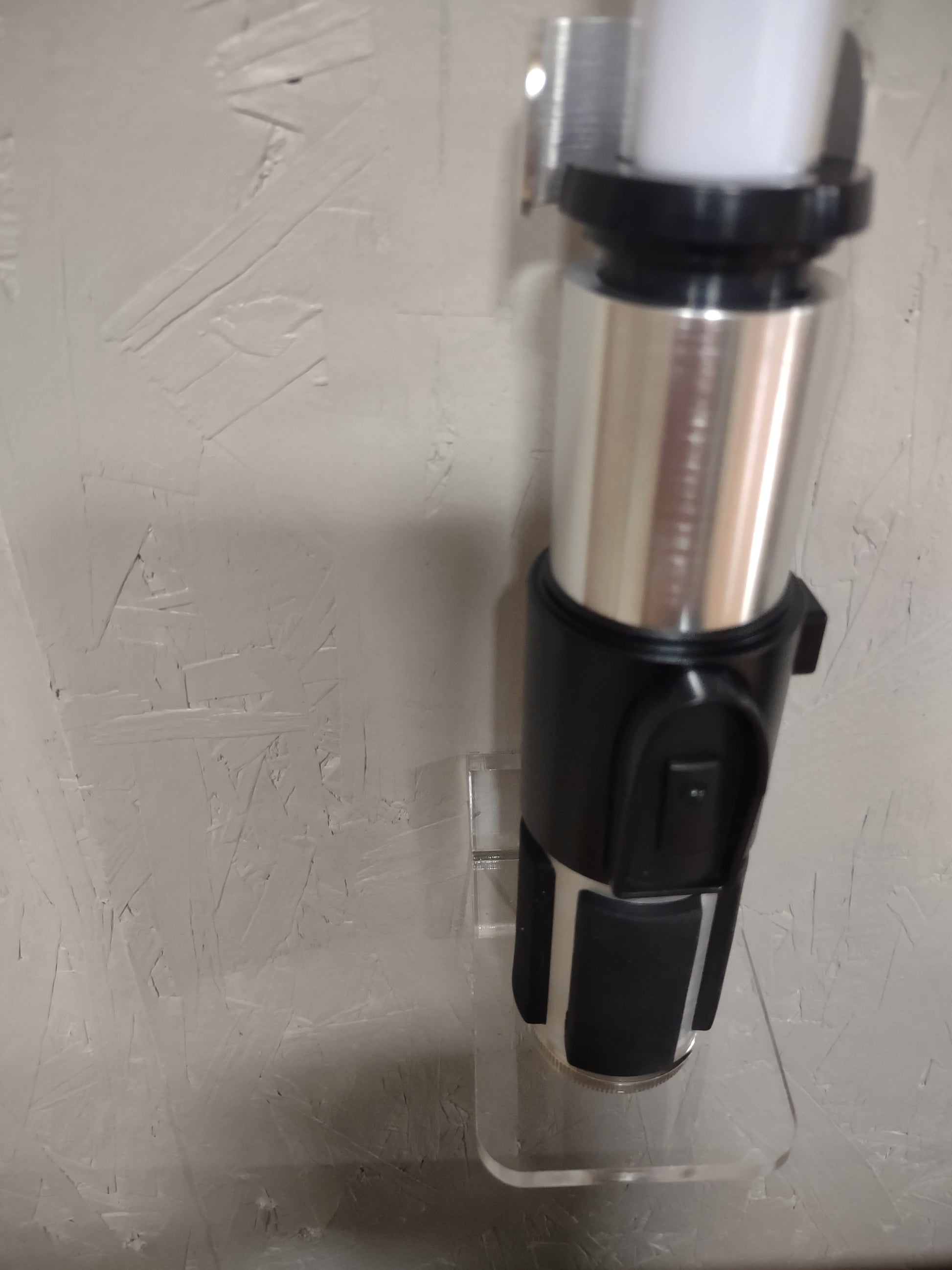 Light saber wall mount handle rest